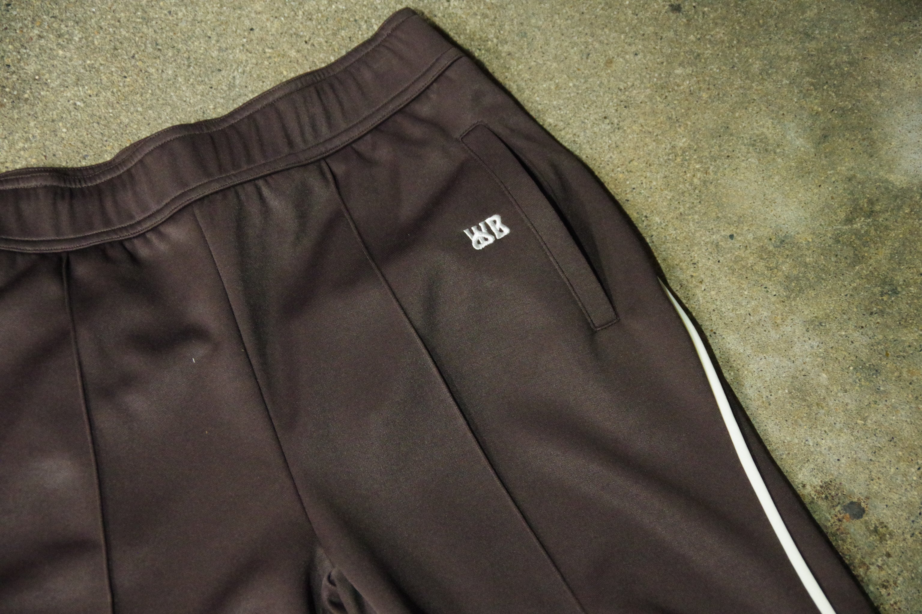 AW23 WALES BONNER KOLA TRACKPANTS -hnw online store